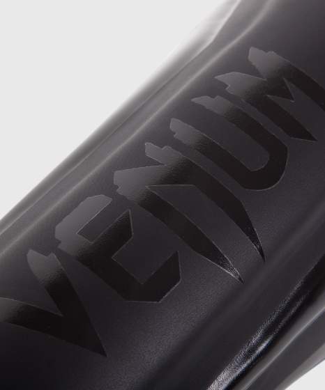 Venum Schienbeinschoner Elite, Schwarz 2